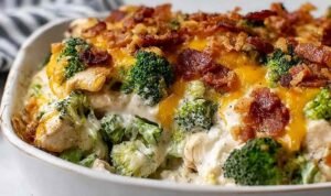 Creamy Low Carb Chicken Casserole with Broccoli and Bacon Creamy low carb chicken casserole with broccoli and bacon topped with golden melted cheddar and mozzarella in a 9x13 baking dish