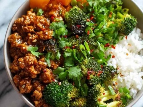 Sweet and spicy ground turkey broccoli bowls with honey sriracha sauce over brown rice