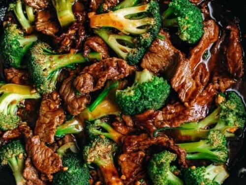 Chinese Beef and Broccoli with glossy brown sauce served over steamed white rice